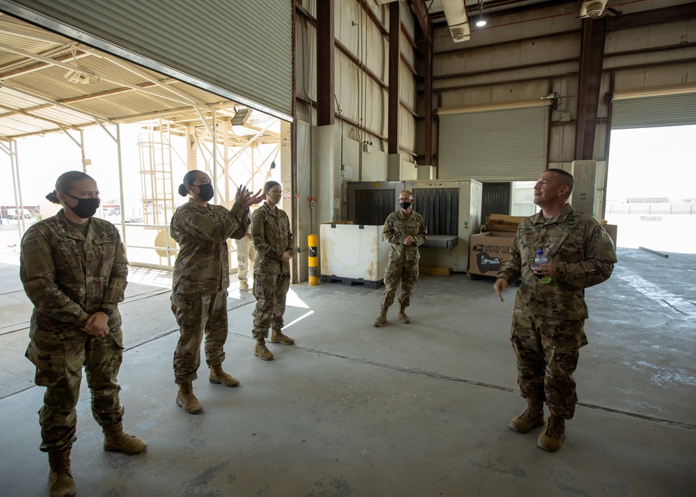 Command Sgt. Maj. Michael Perry visits Soldiers of the Joint Military Mail Terminal