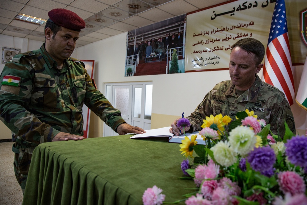 Members of the Combined Joint Task Force meet with the all female Yazidi Company