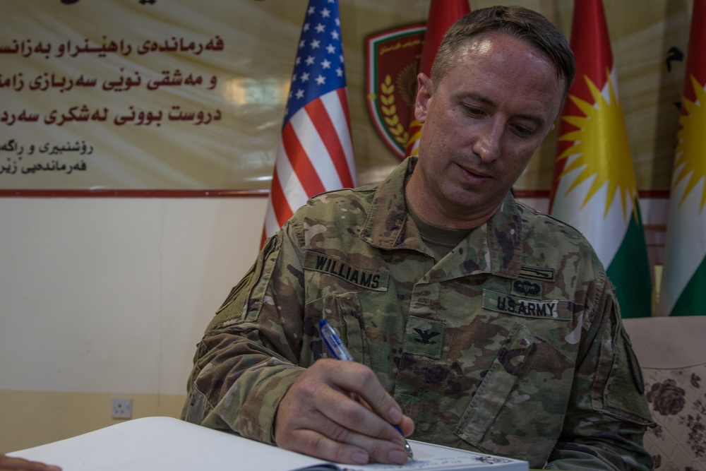 Members of the Combined Joint Task Force meet with the all female Yazidi Company