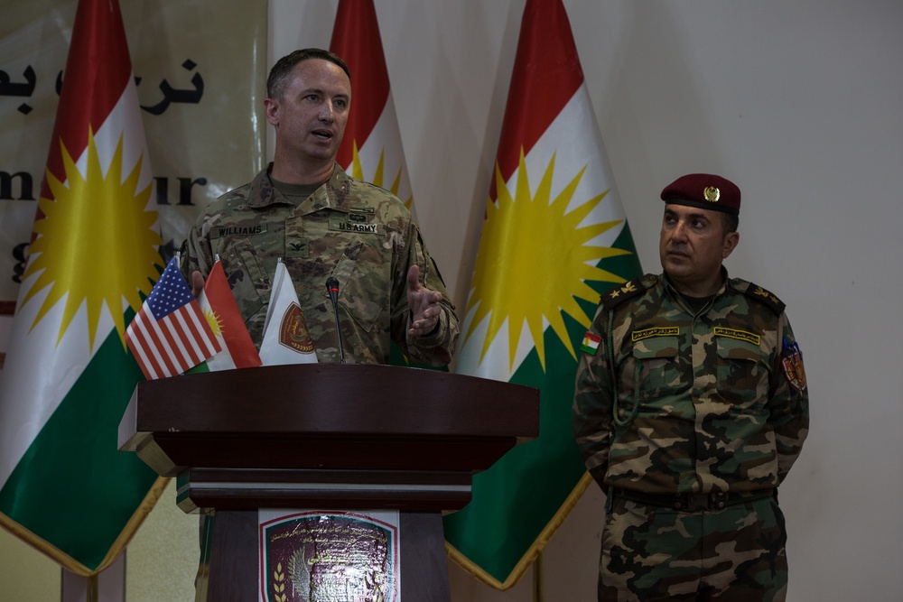 Members of the Combined Joint Task Force meet with the all female Yazidi Company