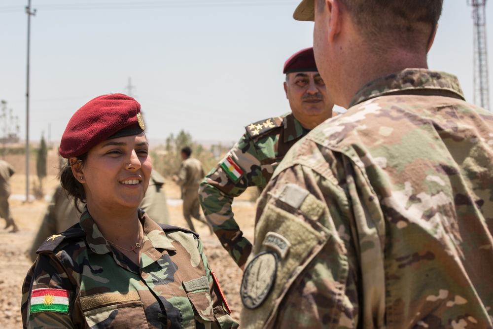 Members of the Combined Joint Task Force meet with the all female Yazidi Company