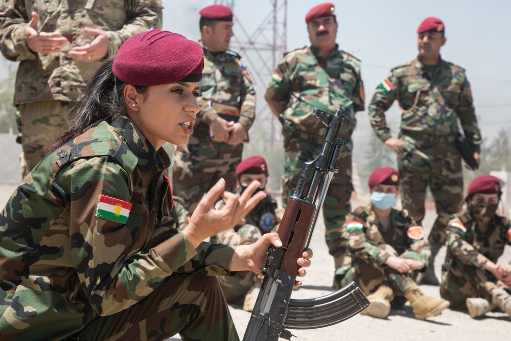 Members of the Combined Joint Task Force meet with the all female Yazidi Company