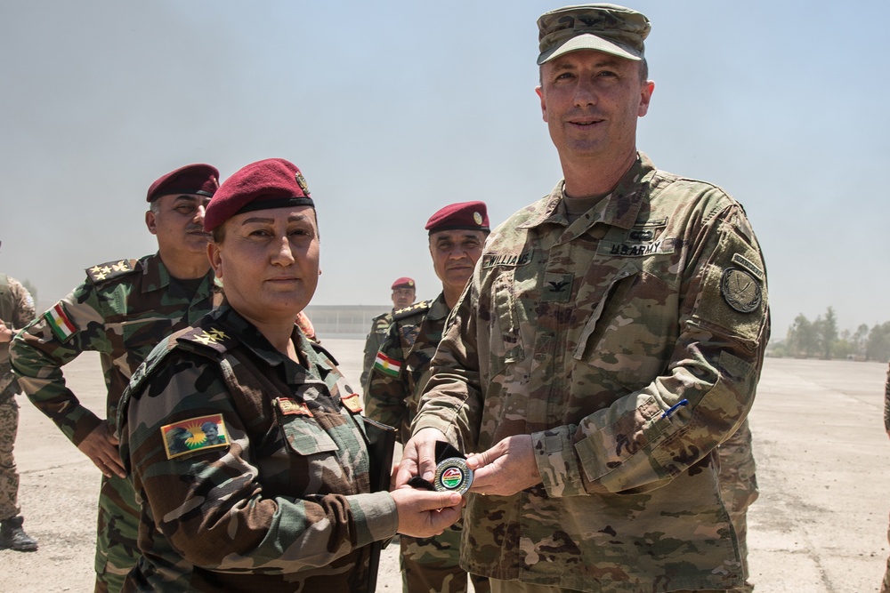 Members of the Combined Joint Task Force meet with the all female Yazidi Company