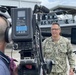 Commander Navy Expeditionary Combat Command, speaks to a camera crew about the importance of the Maritime Expeditionary Security Forces.