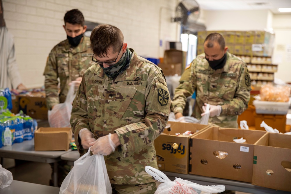 AZNG Assists Local Food Bank