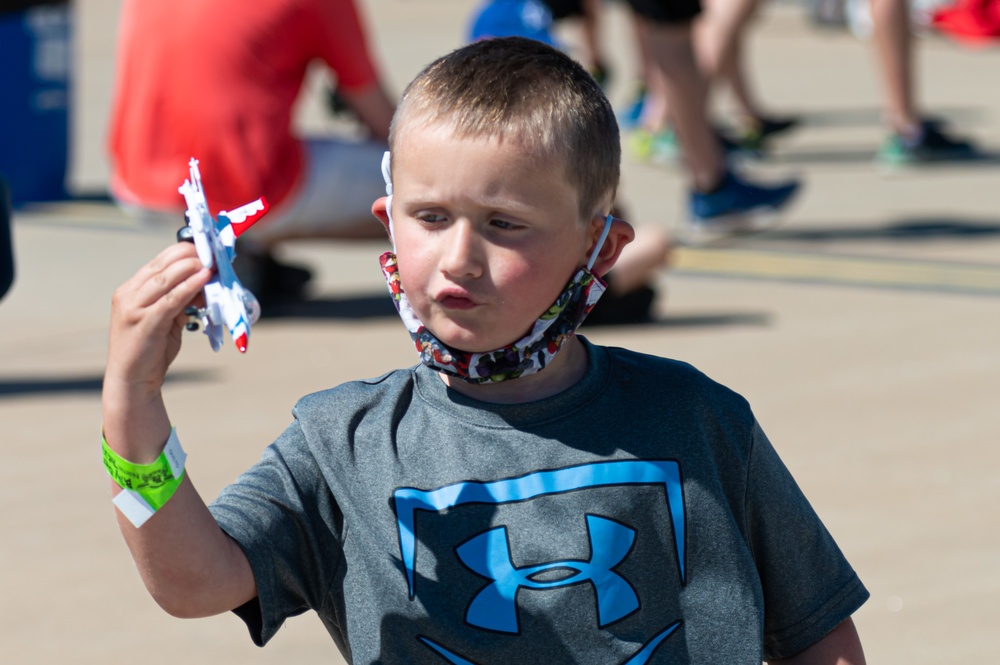 The community gathers to watch the Sound of Speed Airshow