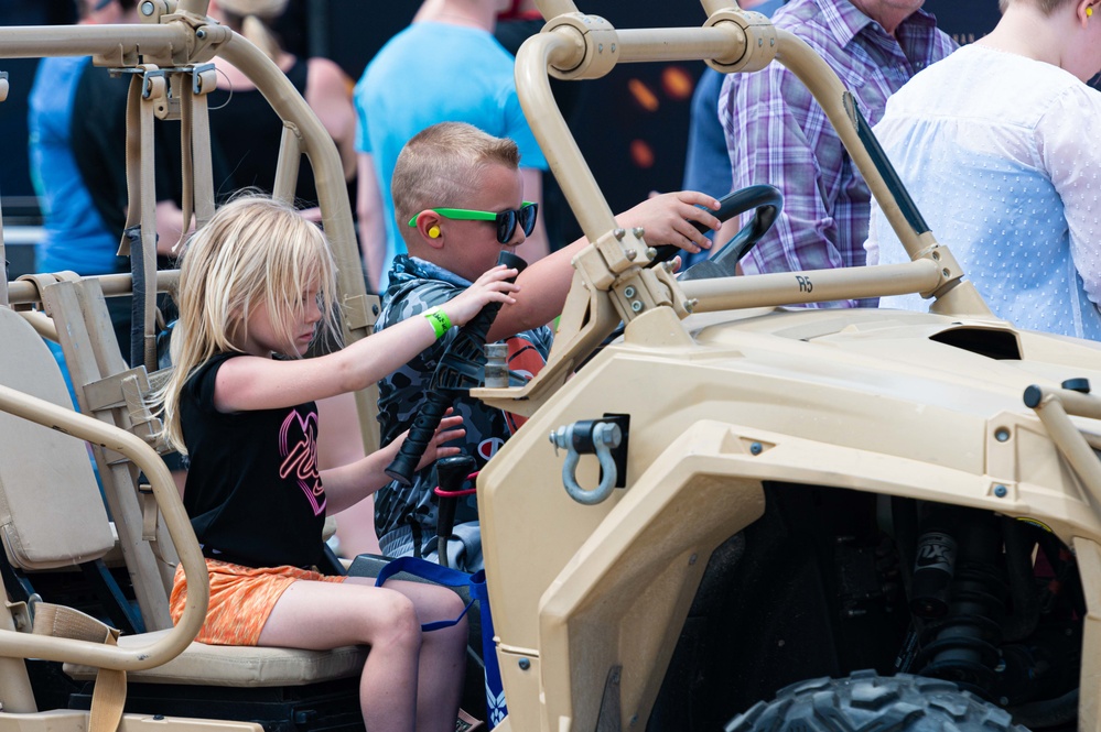 The community gathers to watch the Sound of Speed Airshow