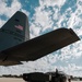 Airmen load a High Mobility Artillery Rocket System onto a C-130 Hercules