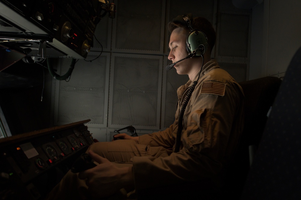 KC-10 Extender boom operator refuels F15-E Strike Eagle