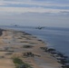 U.S. Air Force C-130js fly over Normandy to commemorate D-Day