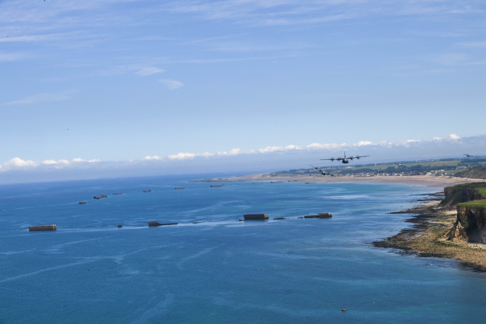 U.S. Air Force C-130js fly over Normandy to commemorate D-Day