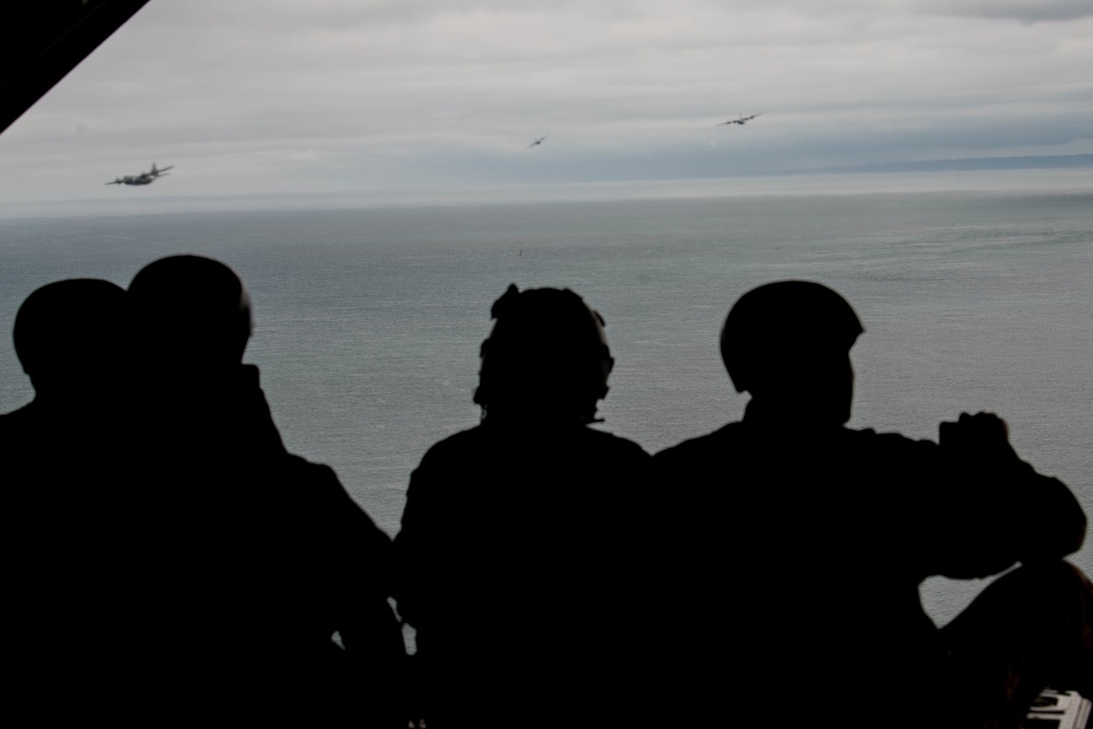 C-130Js conduct flyovers during D-Day 77th anniversary