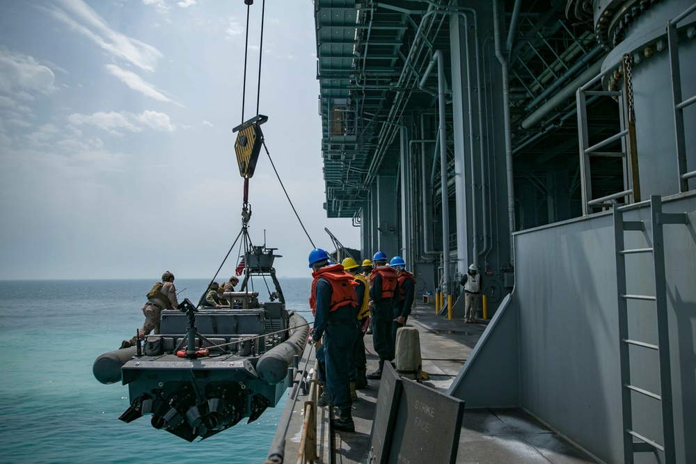 11M Naval Special Warfare Rigid Inflatable Boats arrive on USS Lewis B Puller