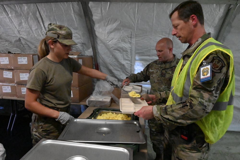 119th Services Flight sets up mobile kitchen and feeds unit during exercise