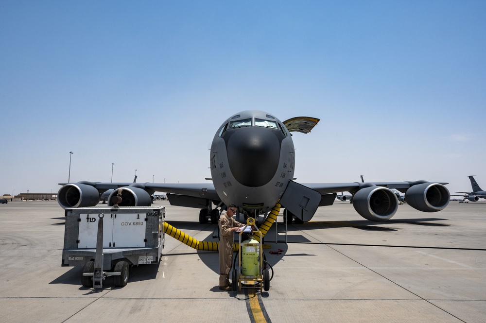 U.S. Air Force KC-135R Stratotanker Pilot Reviews Maintenance Log