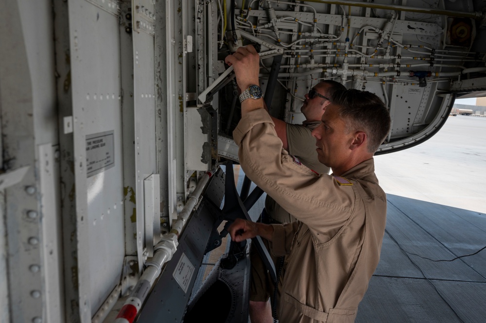 U.S. Air Force Ground And Flight Crew Inspect The Aircraft