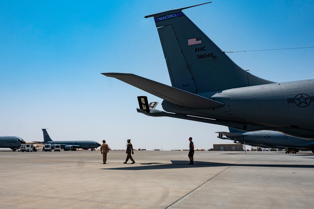 U.S. Air Force Ground And Flight Crew Inspect The Aircraft