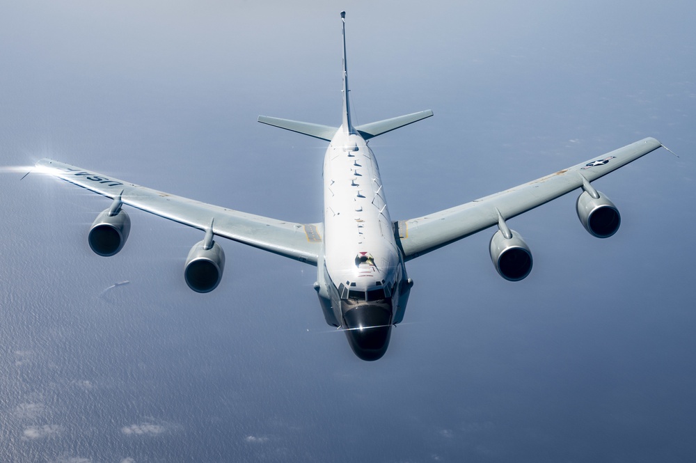 U.S. Air Force RC-135 Rivet Joint Flies Away After Being Refueled