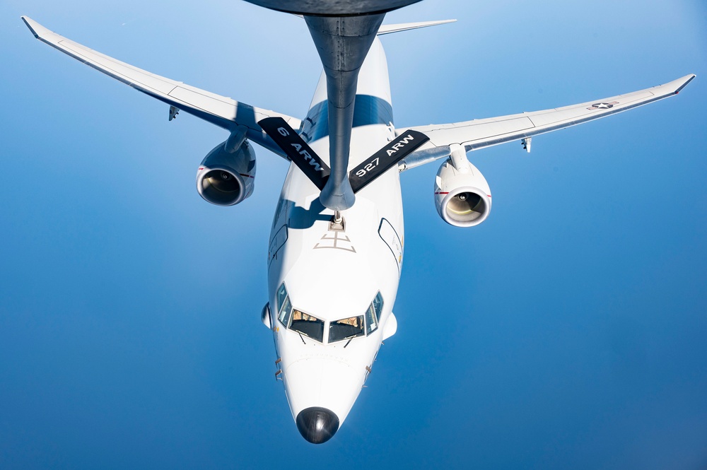 U.S Air Force KC-135R Stratotanker Refuels A U.S. Navy P-8A Poseidon