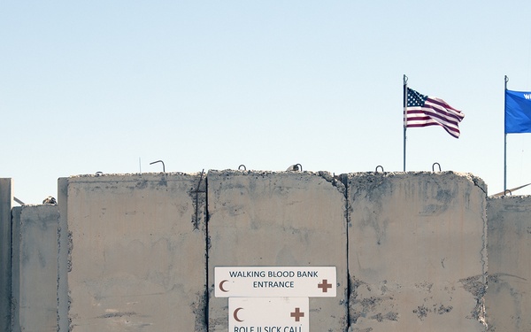 Dozens of U.S., Coalition Forces volunteer blood donations to injured Iraqi soldier