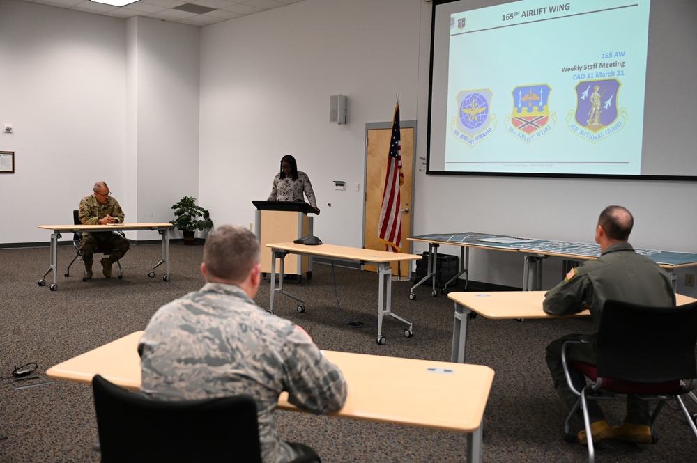 165th Airlift Wing leadership sign a Proclamation on National Sexual Assault Prevention And Awareness Month