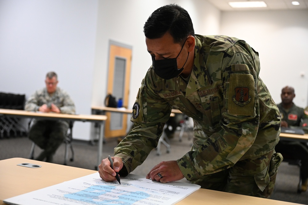 165th Airlift Wing leadership sign a Proclamation on National Sexual Assault Prevention And Awareness Month