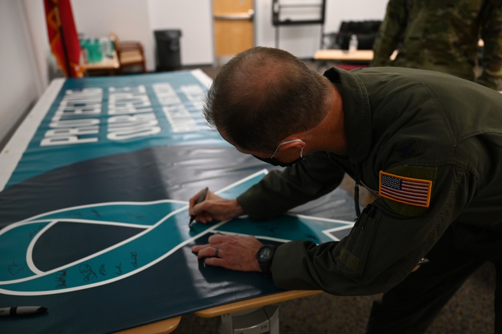 165th Airlift Wing leadership sign a Proclamation on National Sexual Assault Prevention And Awareness Month