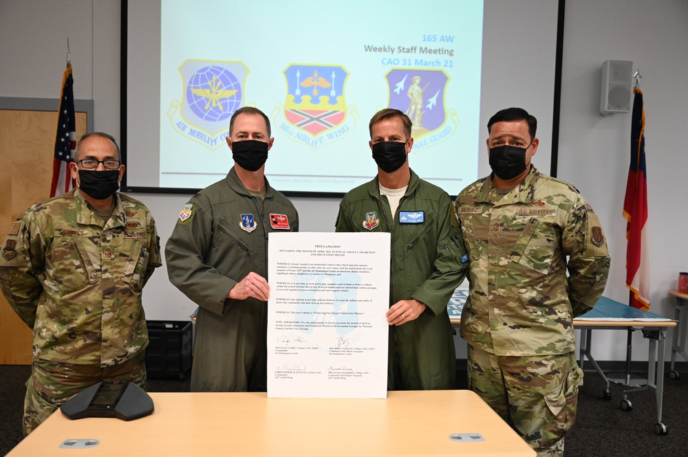 165th Airlift Wing leadership sign a Proclamation on National Sexual Assault Prevention And Awareness Month
