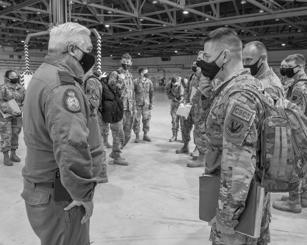 Airmen from the United States Air Force and Royal Canadian Air Force meet during AMALGAM DART 21-1