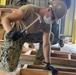 NMCB-4 and 7th ESB construct containerized living units in Palau