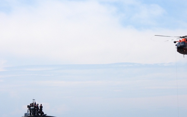 USS Providence and U.S. Coast Guard Helicopter Personnel Transfer Exercise