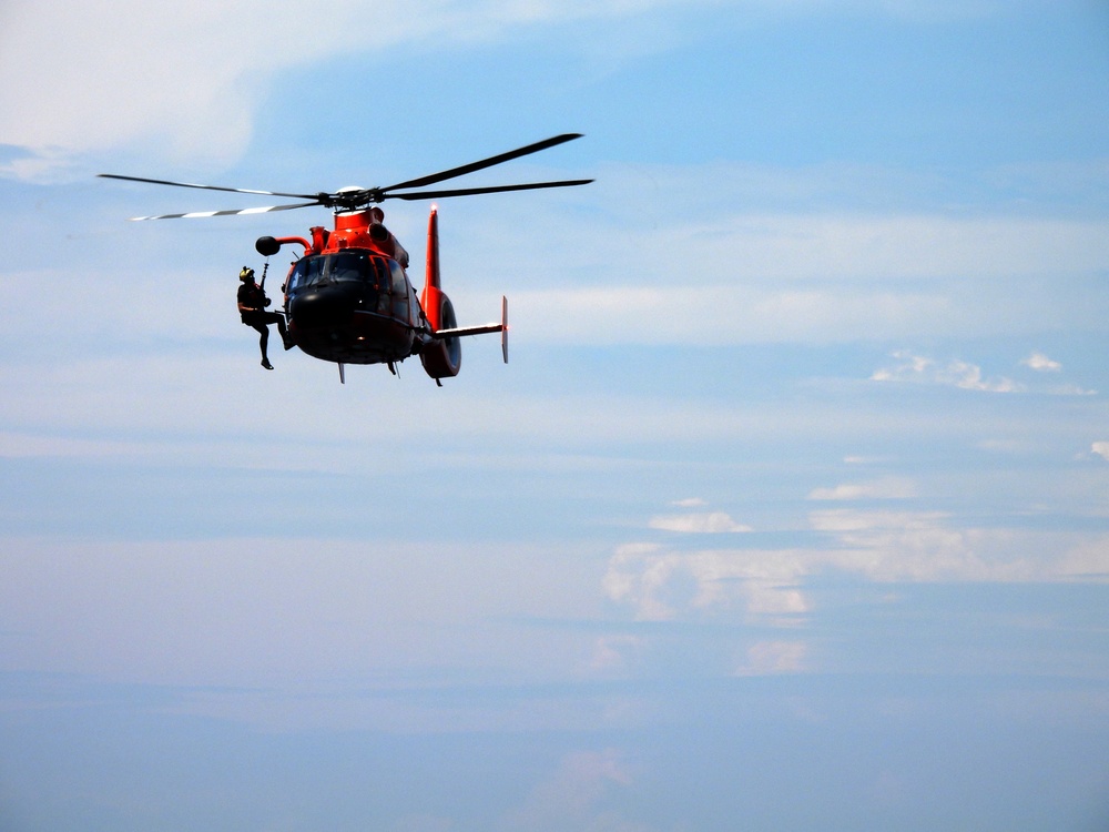 USS Providence and U.S. Coast Guard Helicopter Personnel Transfer Exercise