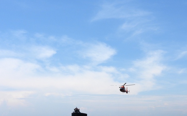 USS Providence and U.S. Coast Guard Helicopter Personnel Transfer Exercise