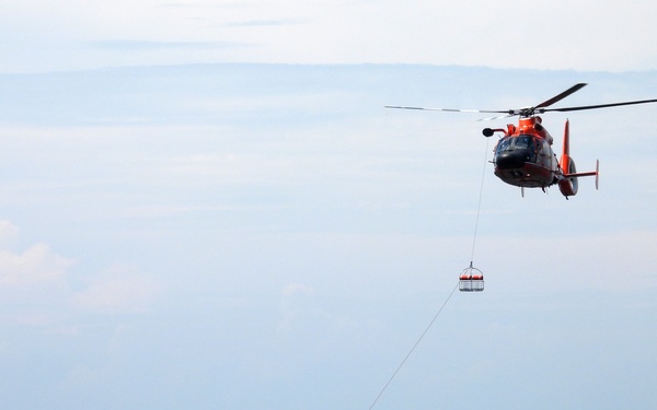 USS Providence and U.S. Coast Guard Helicopter Personnel Transfer Exercise