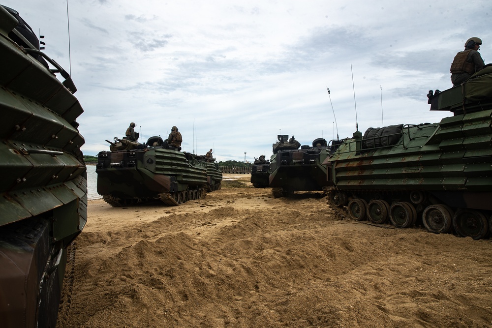 U.S. Marines conduct waterborne operations with assault amphibious vehicles