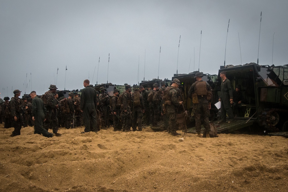 U.S. Marines conduct waterborne operations with assault amphibious vehicles