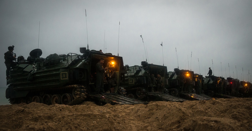 U.S. Marines conduct waterborne operations with assault amphibious vehicles