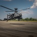 A AH-64D Apache returning from the Live Fire range