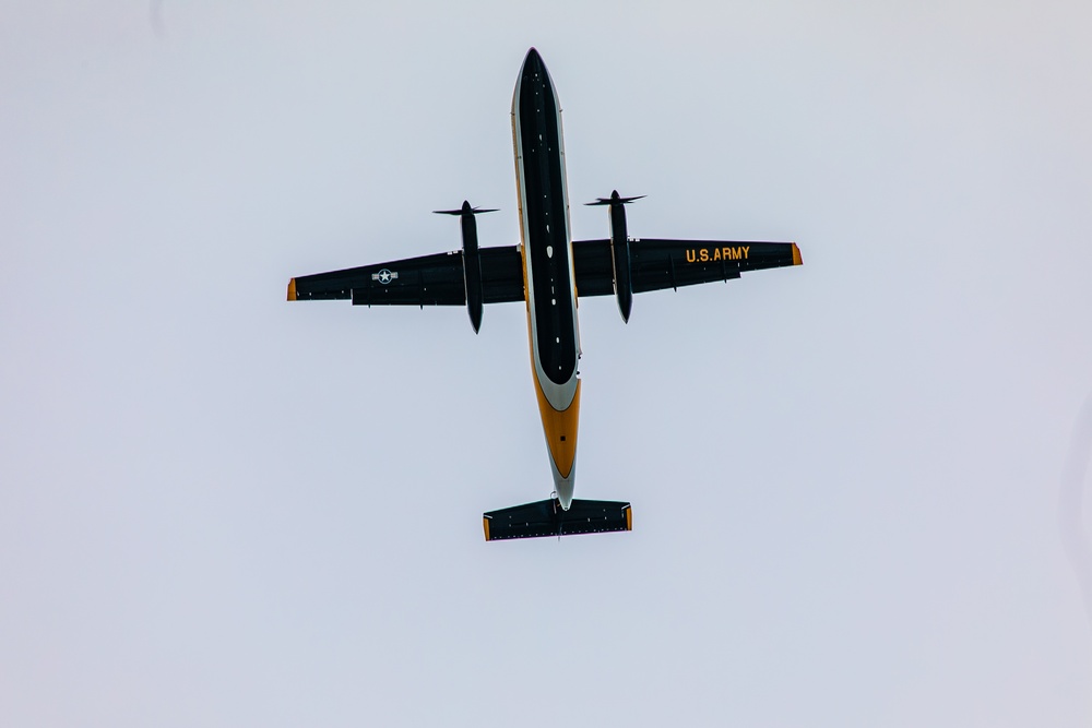 U.S. Army Parachute Team flies their aircraft at an airshow