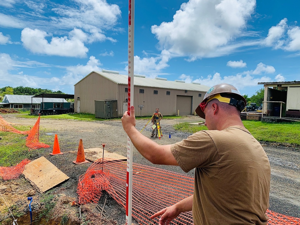 NMCB-4 and 7th ESB construct containerized living units in Palau