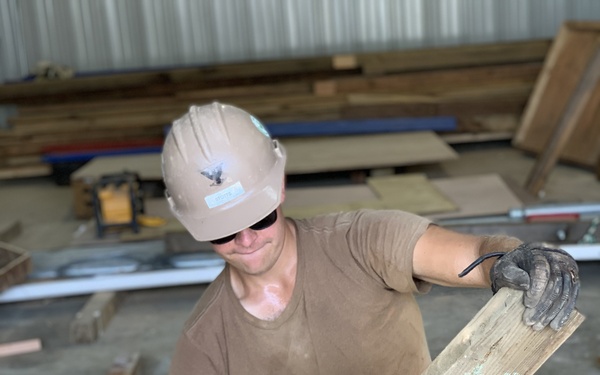 NMCB-4  constructs containerized living units in Palau