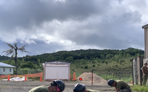 NMCB-4 and 7th ESB construct containerized living units in Palau