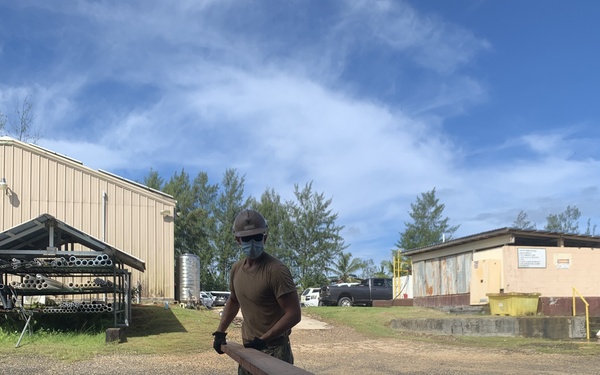 NMCB-4 and 7th ESB construct containerized living units in Palau