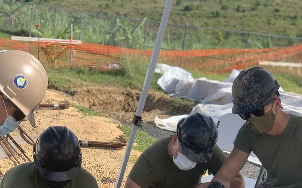 NMCB-4 and 7th ESB construct containerized living units in Palau