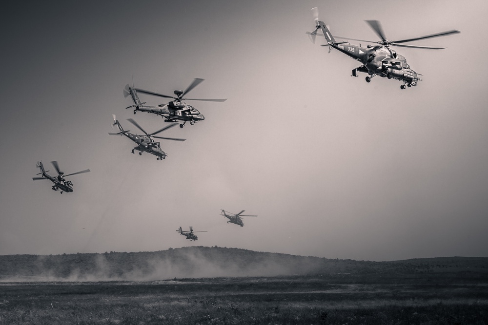 12th CAB Apaches and Hungarian Defense Force Hinds in first ever joint live fire