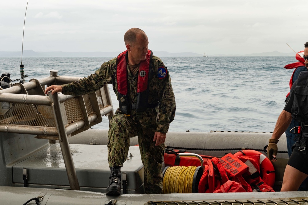 Rear Adm. Christopher Engdahl, commander, Expeditionary Strike Group 7/Task Force 76 arrives to USS New Orleans