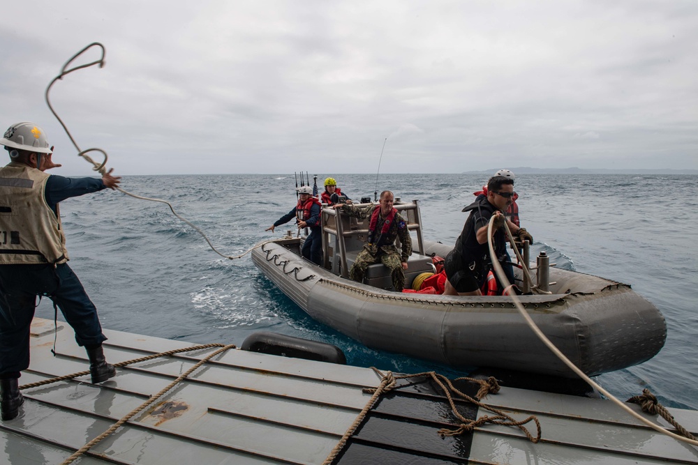 Rear Adm. Christopher Engdahl, commander, Expeditionary Strike Group 7/Task Force 76 arrives to USS New Orleans