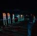 Sailors assigned to USS New Orleans (LPD 18) participate in a qualifying low-light 9 mm gun shoot