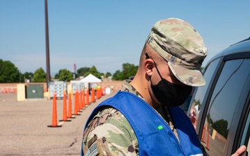 4th Infantry Division Soldiers vaccine Pueblo residents at the Colorado State Fairgrounds