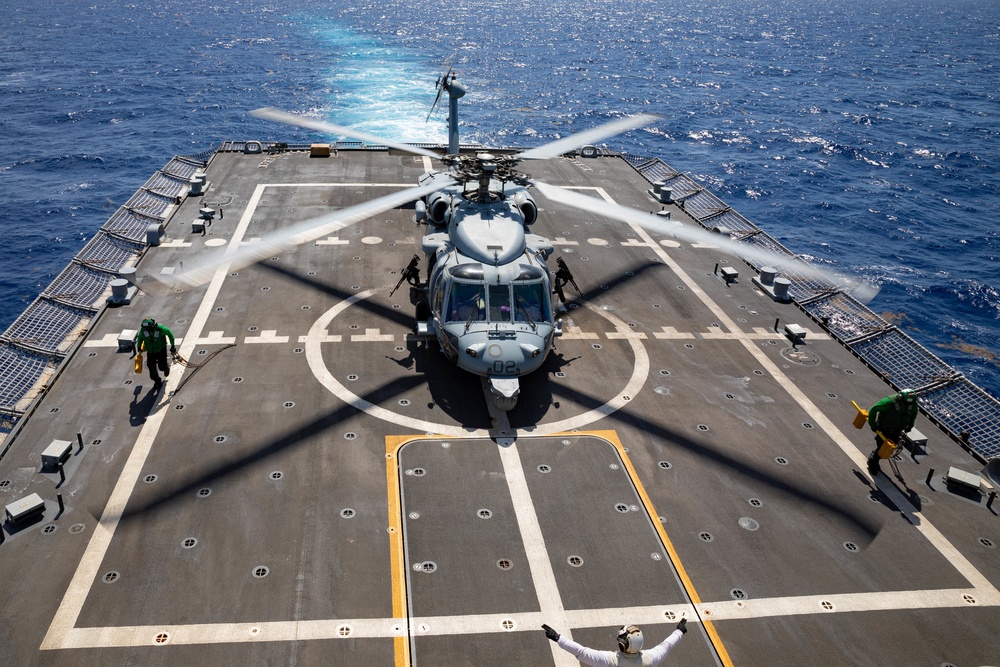 MH-60S Sea Hawk Helicopter Attached to HSC 22 Prepares to Take Off From the Flight Deck of USS Sioux City